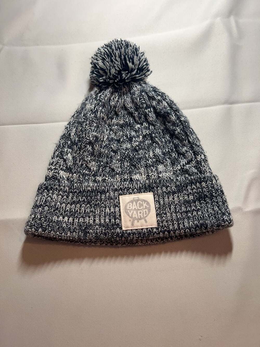 Backyard Cable Knit Pom Pom Beanie Hat Grey and White
